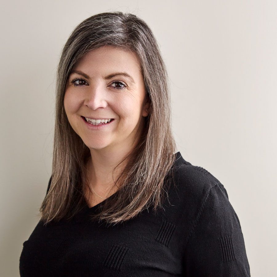 woman smiling wearing a black shirt